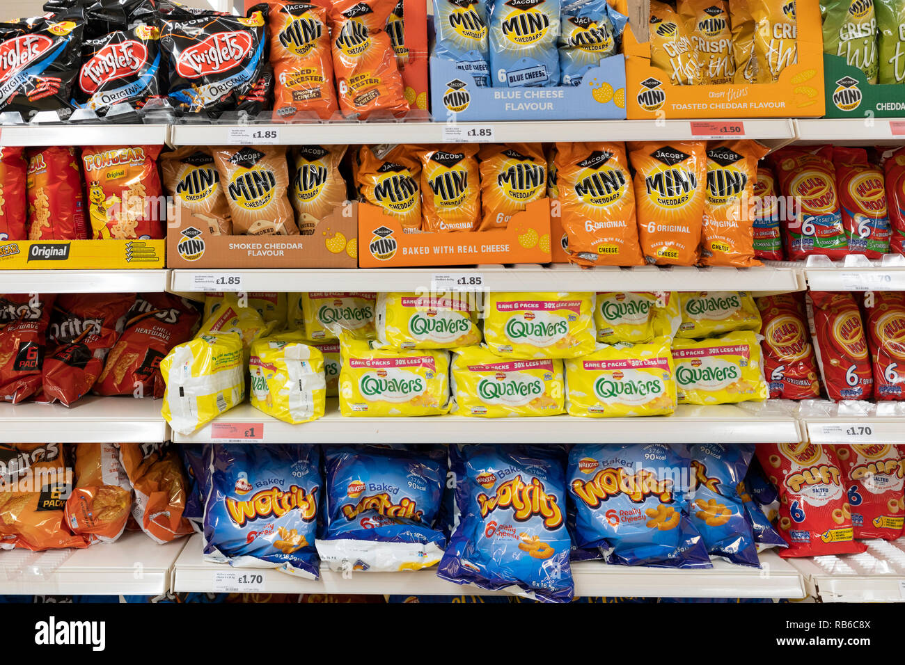 Bags of crisps on sale at a Sainsburys supermarket, UK Stock Photo