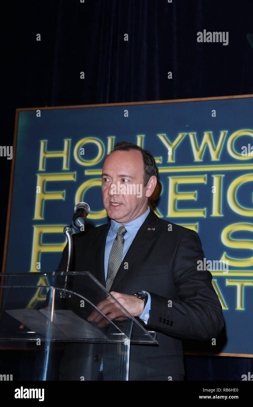 LOS ANGELES, CA - NOVEMBER 09: Hollywood Foreign Press Association president Philip Berk  and actor Kevin Spacey speak onstage during the Hollywood Foreign Press Association's (HFPA) Cecil B. DeMille Award recipient announcement at the Four Seasons Hotel on November 9, 2010 in Los Angeles, California.   People:  Kevin Spacey Stock Photo