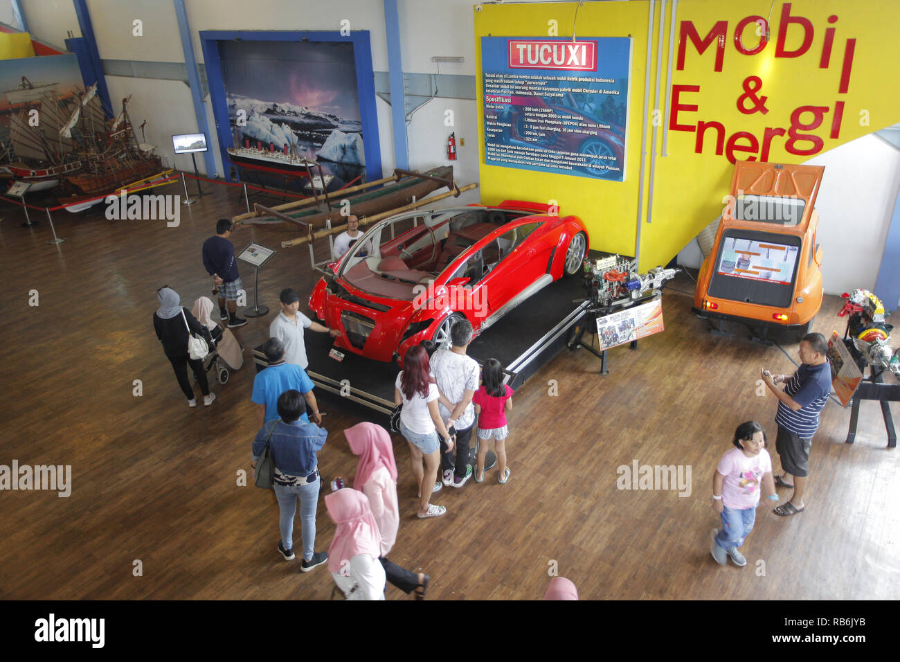 Malang, East Java, Indonesia. 5th Jan, 2019. A number of visitors seen observing the Tucuxi electric car which was damaged by crashing several years ago at the Angkut Museum (Museum of Transportation). This museum has thousands of collections of transportation vehicles from various Credit: Adriana Adinandra/SOPA Images/ZUMA Wire/Alamy Live News Stock Photo