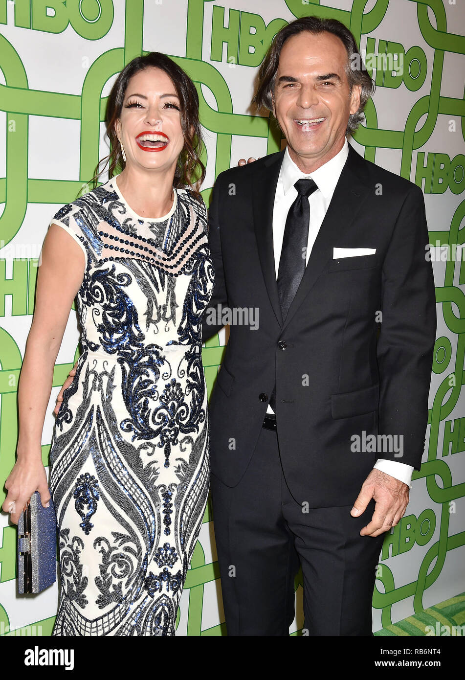 BEVERLY HILLS, CA - JANUARY 06: Emmanuelle Vaugier (L) and Vince
