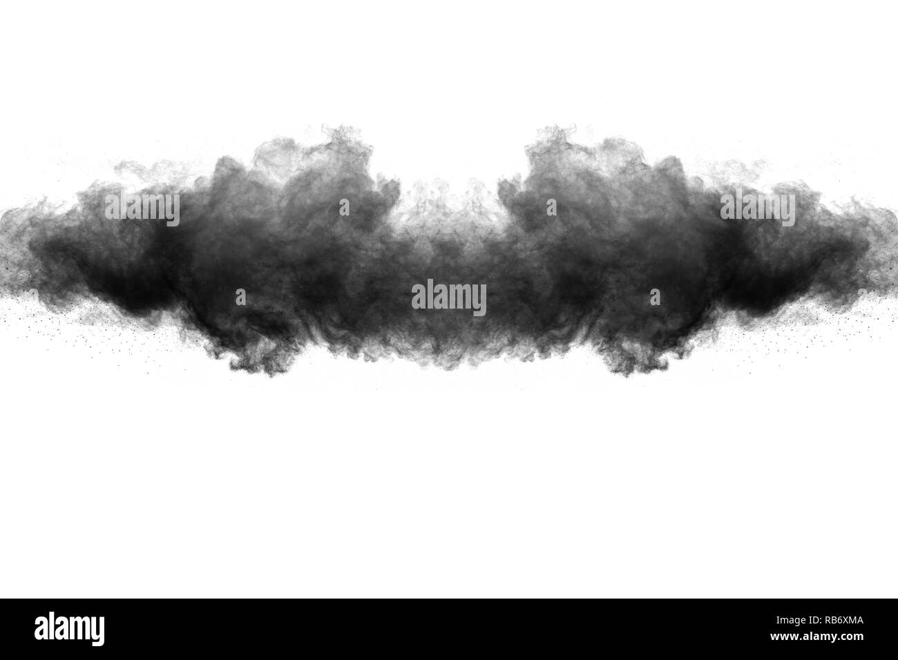 Black powder explosion against white background. Charcoal dust particle