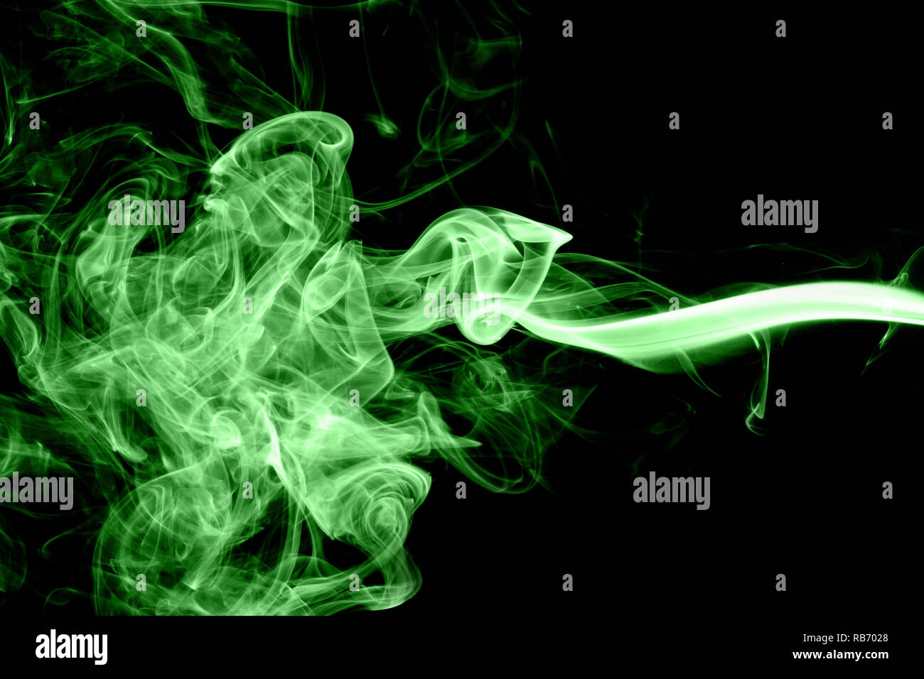 Green smoke on black background Stock Photo - Alamy
