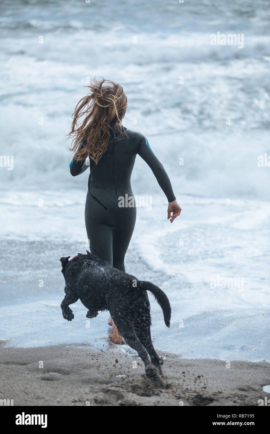 Woman wetsuit winter hires stock photography and images Alamy