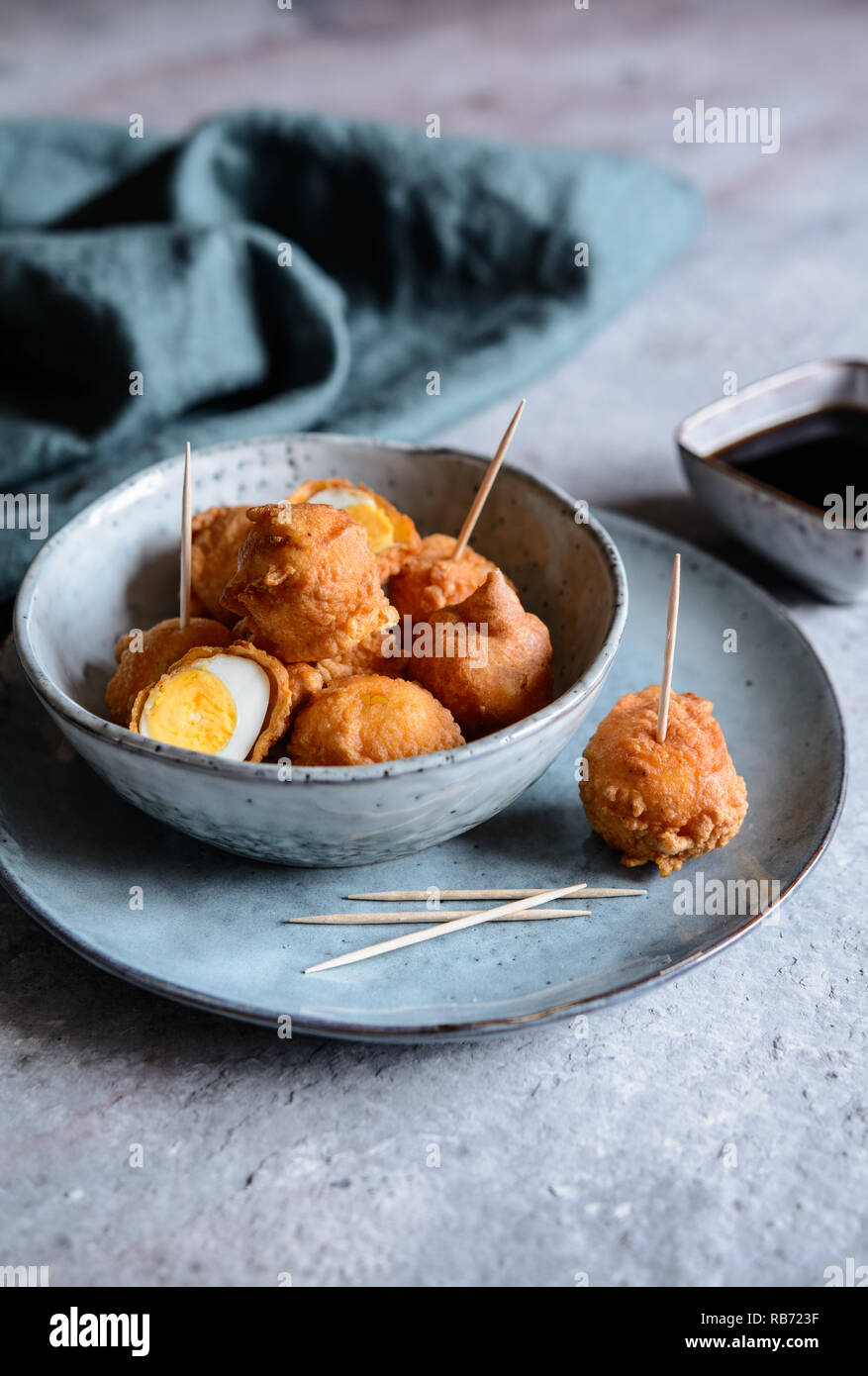 Kwek Kwek traditional deep fried quail eggs coated with batter served