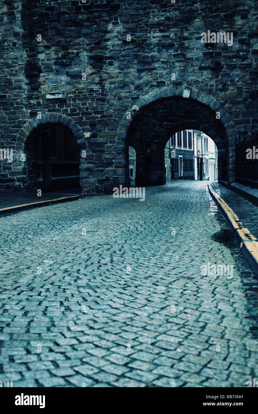 Two archways on a cobbled street in Maastricht, Netherlands. Stock Photo