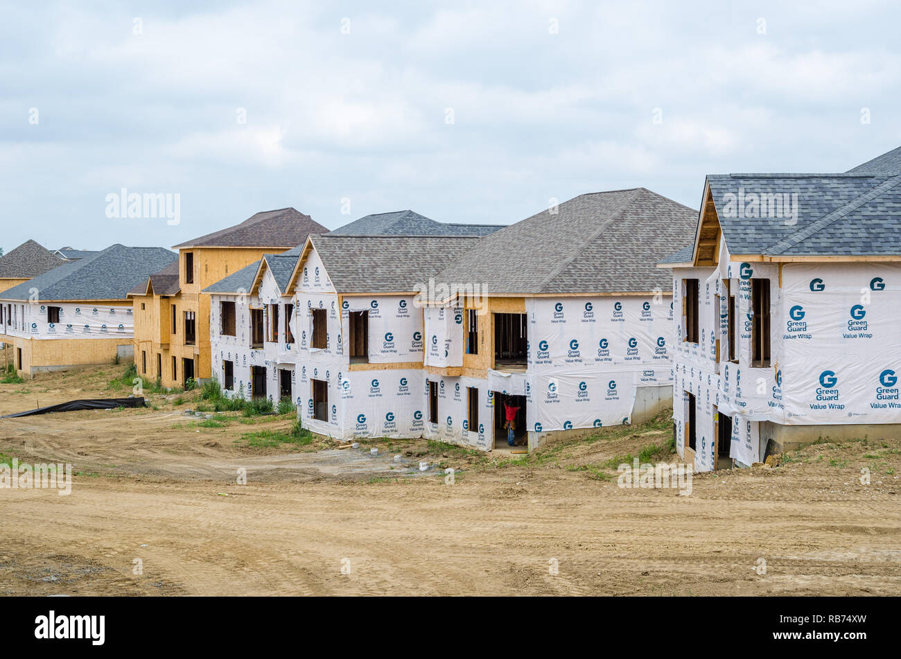 Suburban houses under construction Stock Photo