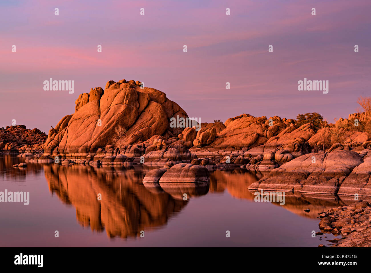 Sunset On The Rocks with reflection & color Stock Photo