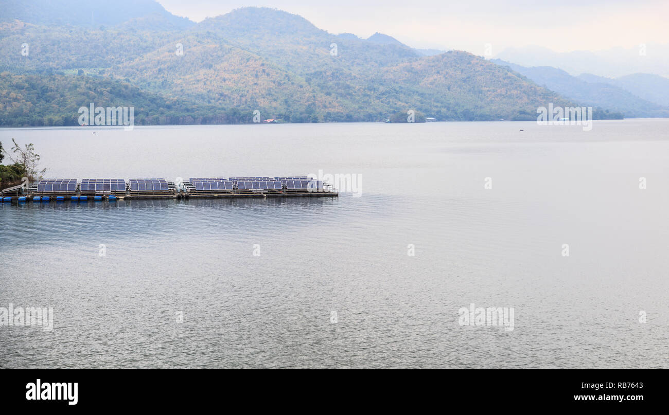 Srinagarind Dam Landscape Panorama with solar power generation panels and flotation devices, floating on reservoir water, Kanchanaburi, Thailand. Alte Stock Photo