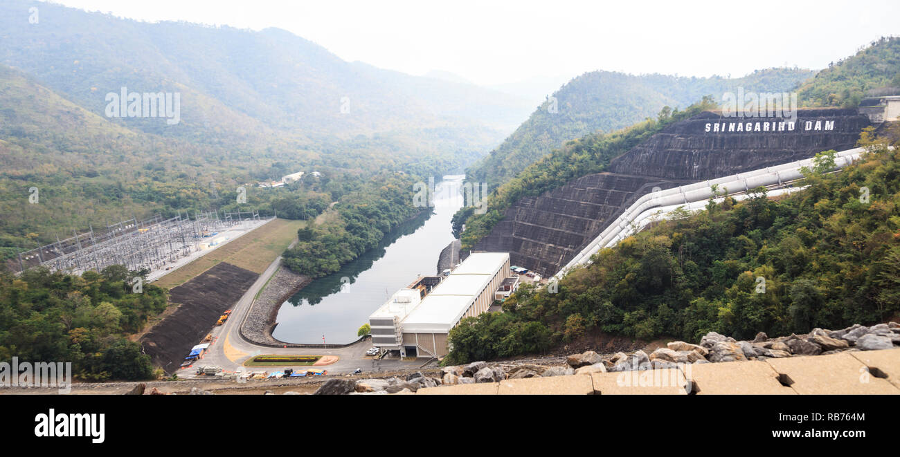 Srinagarind Dam Landscape Panorama with power station built for river regulation and hydroelectric power generation on Khwae Yai river, Kanchanaburi,  Stock Photo