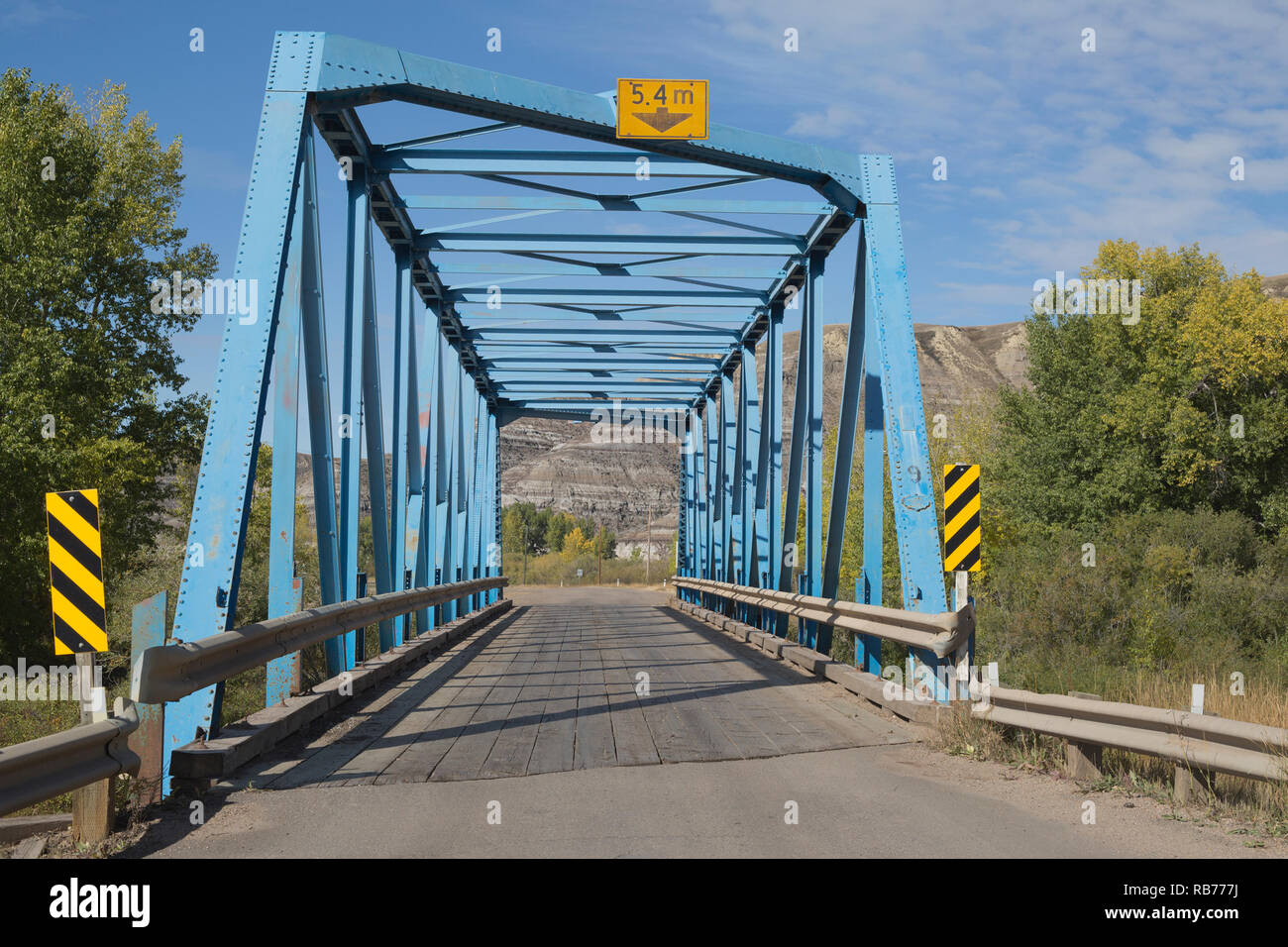 One lane metal bridge, #9 of a series of 11 bridges across the Rosebud River on a 6 km stretch from Rosedale to Wayne in rural Alberta, Canada Stock Photo