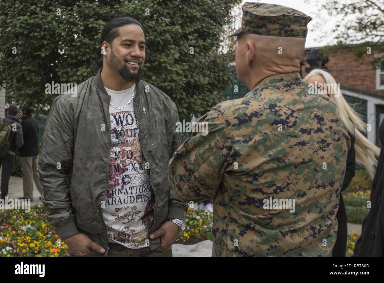 Commandant of the Marine Corps Gen. Robert B. Neller, right, speaks to Jey Uso, WWE wrestler, at the Home of the Commandants, Washington, D.C., Dec. 13, 2016. Uso and other Superstars were invited to meet with the Commandant, tour Marine Barracks Washington, and eat lunch with Marines. Stock Photo
