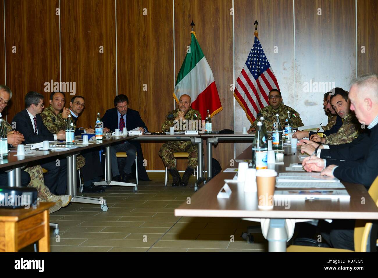 Gen. Carmelo De Cicco in the middle of members of United States Army, the Italian army, Italian authorities and Italian civilians from COMIPAR (Environmental Protection Committee) on Infrastructures Program USA Garrison Italy, Projects Fiscal Year 17 at Caserma Del Din in Vicenza, Italy, Dec. 13, 2016. Stock Photo