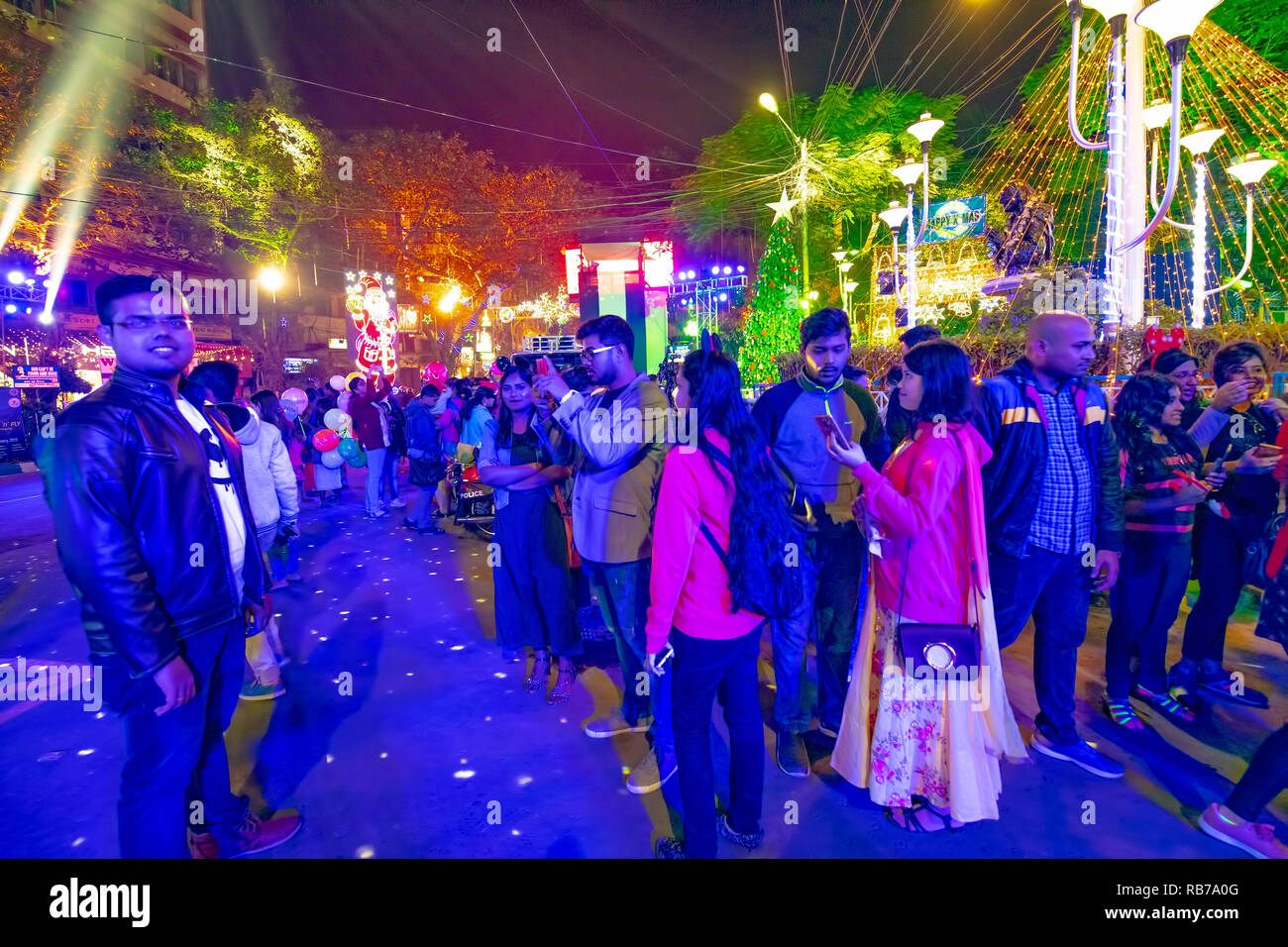 Christmas-eve,at Park Street,celebration,gathering,by young people,male,female,Kolkata,India. Stock Photo