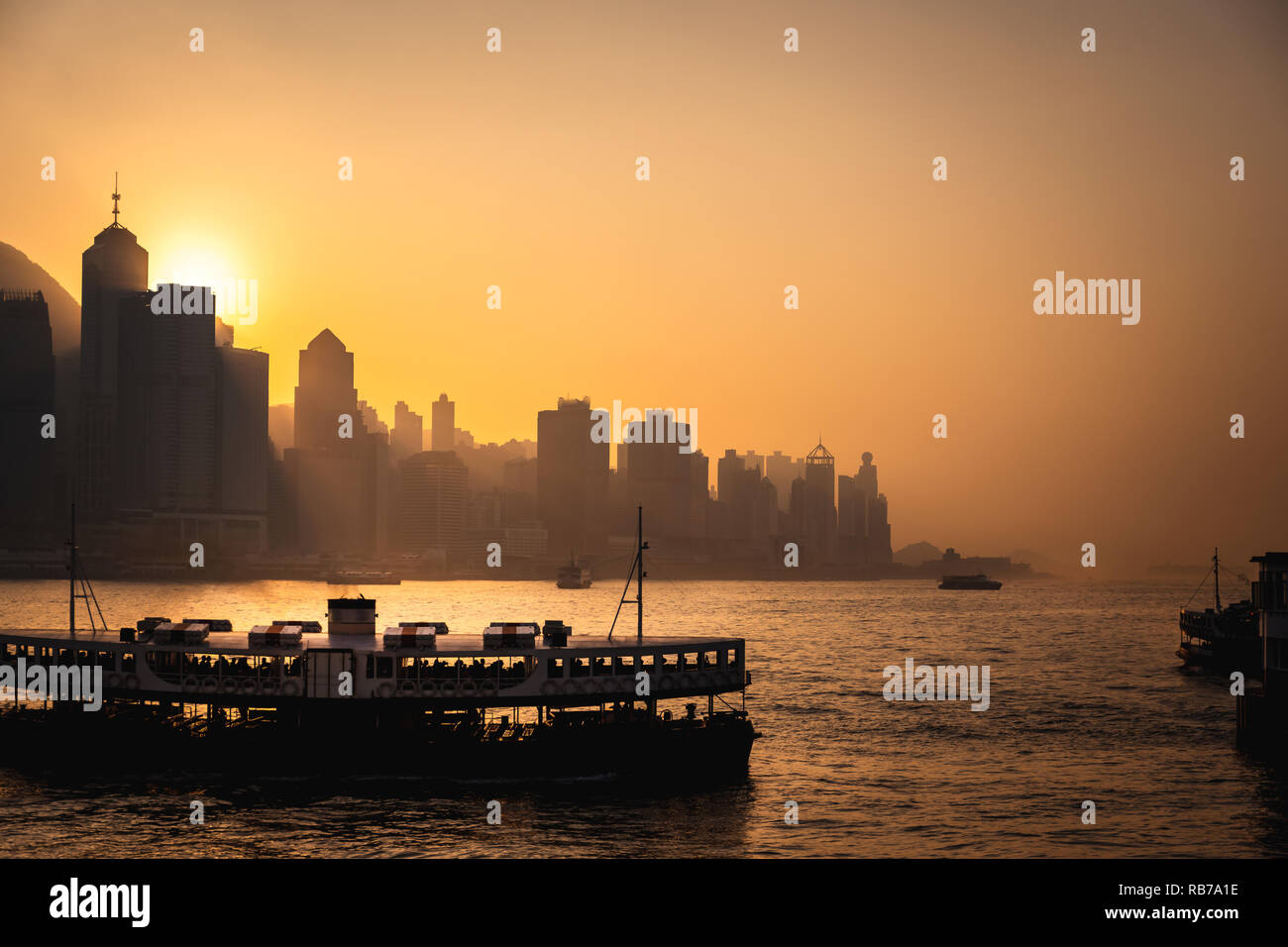Hong Kong Victoria Harbour view with sunset Stock Photo - Alamy