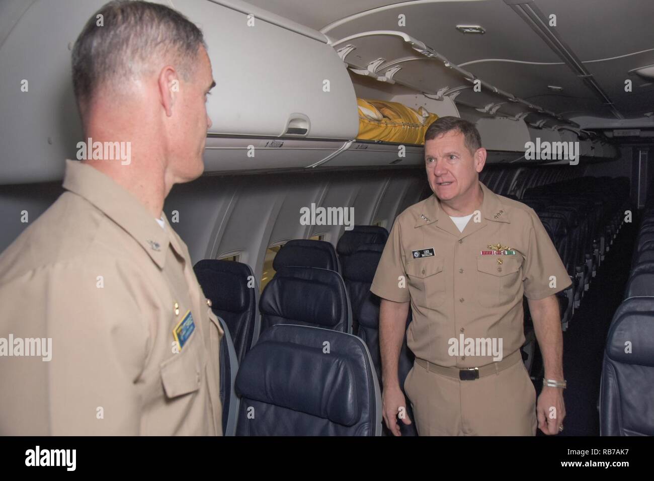 FORT WORTH, Texas (Dec. 1, 2016) Vice Adm. Luke McCollum, chief of Navy Reserve/commander, Navy Reserve Force, tours of a C-40A 'Clipper' with Capt. Scott Eargle, commodore, Fleet Logistics Support Wing, and talks about various operations conducted by Fleet Logistics Support Squadron (VR) 59 at Naval Air Station Fort Worth Joint Reserve Base.  McCollum, formerly deputy commander of the Navy Expeditionary Combat Command, became the 14th chief of Navy Reserve/commander, Navy Reserve Force Sept. 2016. Stock Photo