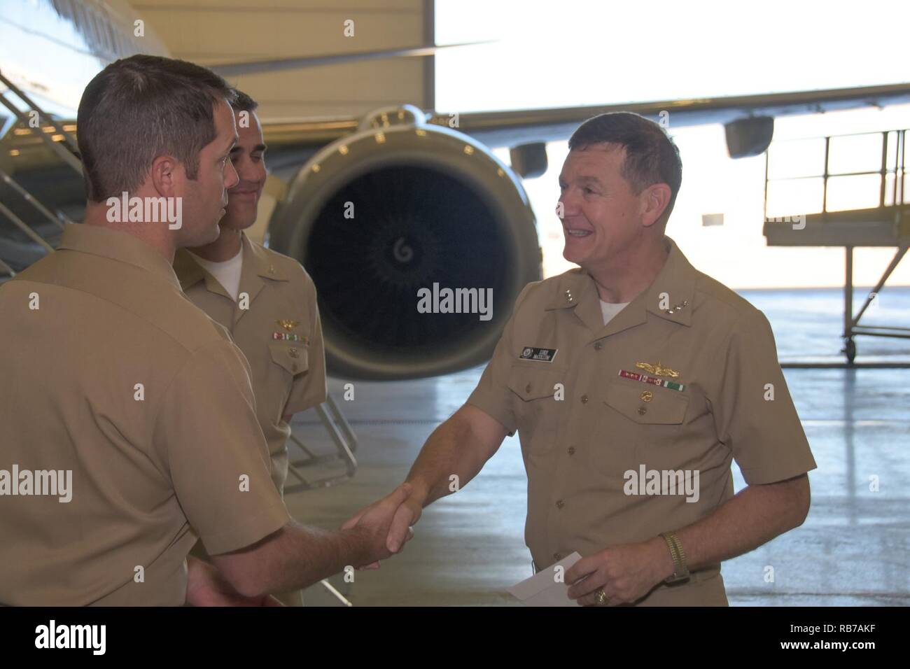 FORT WORTH, Texas (Dec. 1, 2016) Vice Adm. Luke McCollum, chief of Navy Reserve/commander, Navy Reserve Force, meets Cmdr. Robert Stanley, commanding officer of Fleet Logistics Support Squadron (VR) 59, during a tour of a C-40A 'Clipper' at Naval Air Station Fort Worth Joint Reserve Base.  McCollum, formerly deputy commander of the Navy Expeditionary Combat Command, became the 14th chief of Navy Reserve/commander, Navy Reserve Force Sept. 2016. Stock Photo