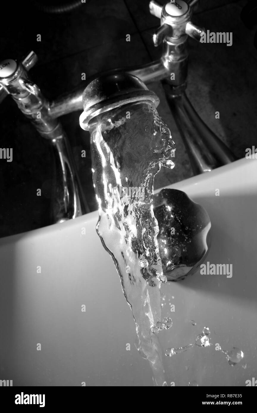Water tap running Black and White Stock Photos & Images Alamy