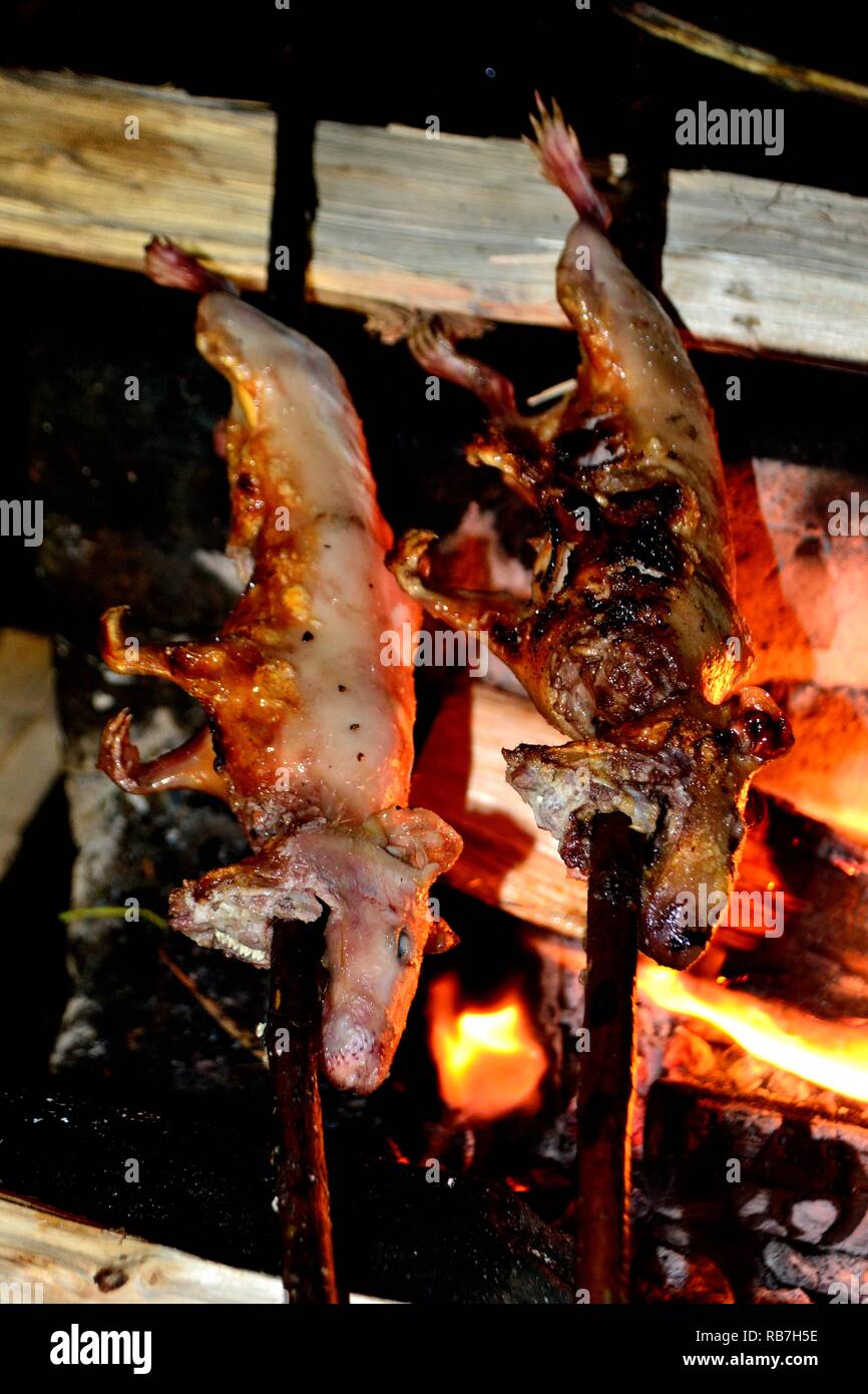 Grilled Cuy - Peasant community restaurant - Llanganuco lagoons  - National park HUASCARAN. Department of Ancash.PERU             Stock Photo
