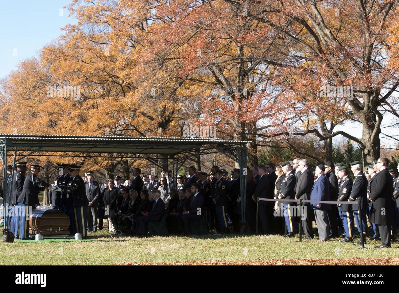 Mourners approach Section 60 in Arlington National Cemetery for the