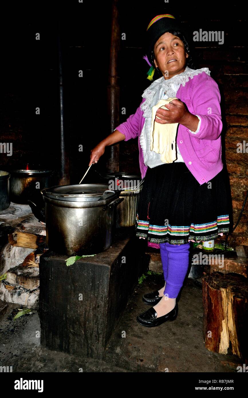 Cooking corn tortilla - Peasant community restaurant - Llanganuco lagoons  - National park HUASCARAN. Department of Ancash.PERU        Stock Photo