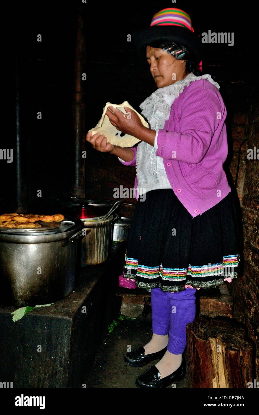 Cooking corn tortilla - Peasant community restaurant - Llanganuco lagoons  - National park HUASCARAN. Department of Ancash.PERU        Stock Photo