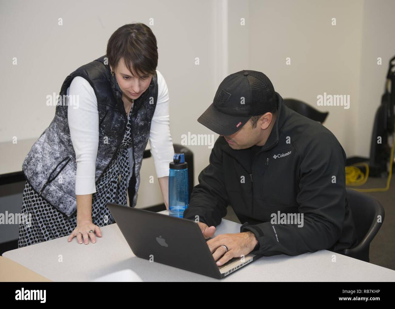 NORFOLK, Va. (Dec. 6, 2016) Regan Hertzler, assistant program manager ...
