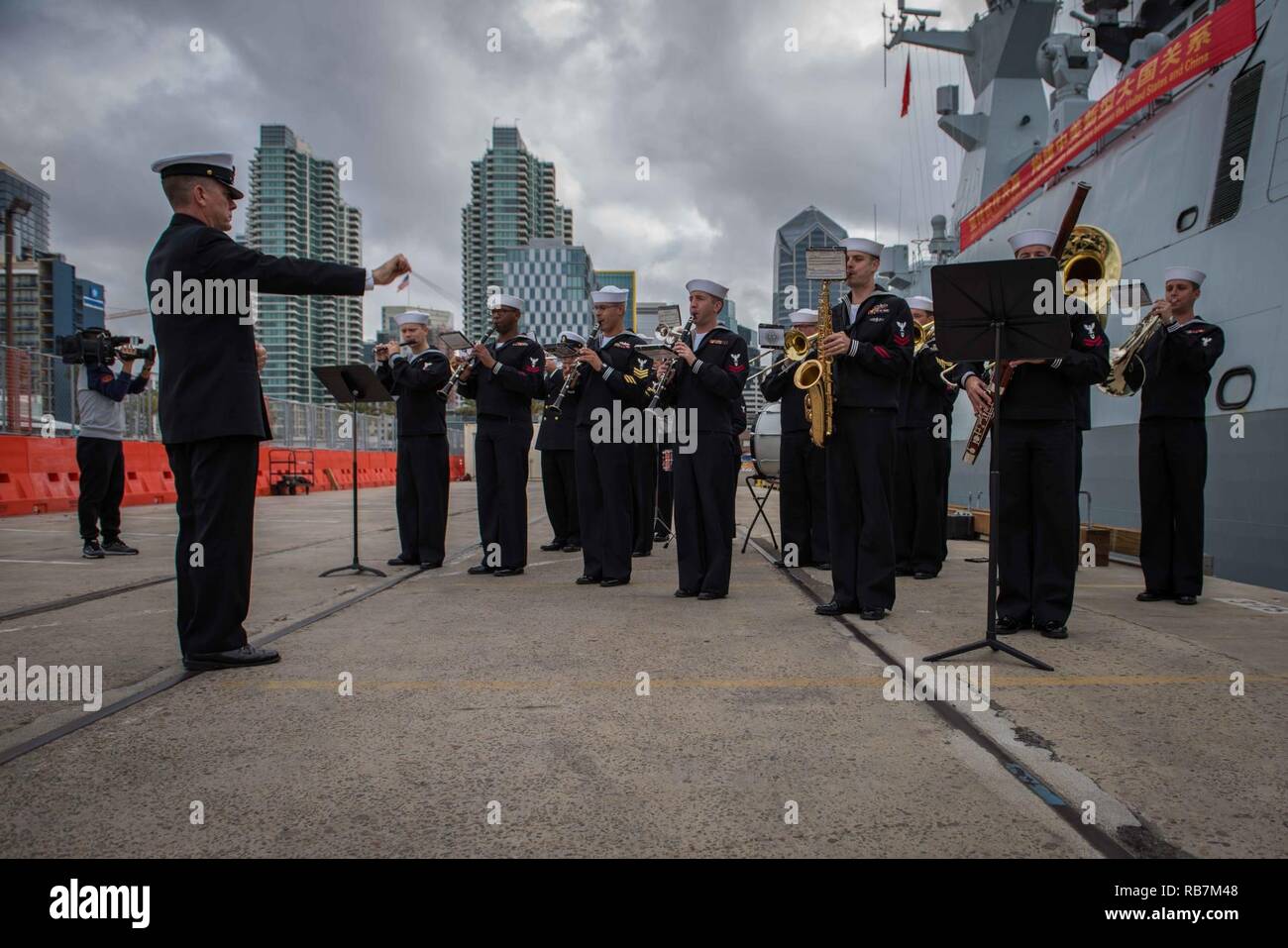 SAN DIEGO (Dec. 6, 2016) The U.S. Navy band performs on B Street Pier for the arrival of the People’s Liberation Army (Navy). Rear Adm. Jay Bynum, commander of Carrier Strike Group Nine, is hosting three PLA(N) ships during a routine port visit in San Diego. Stock Photo