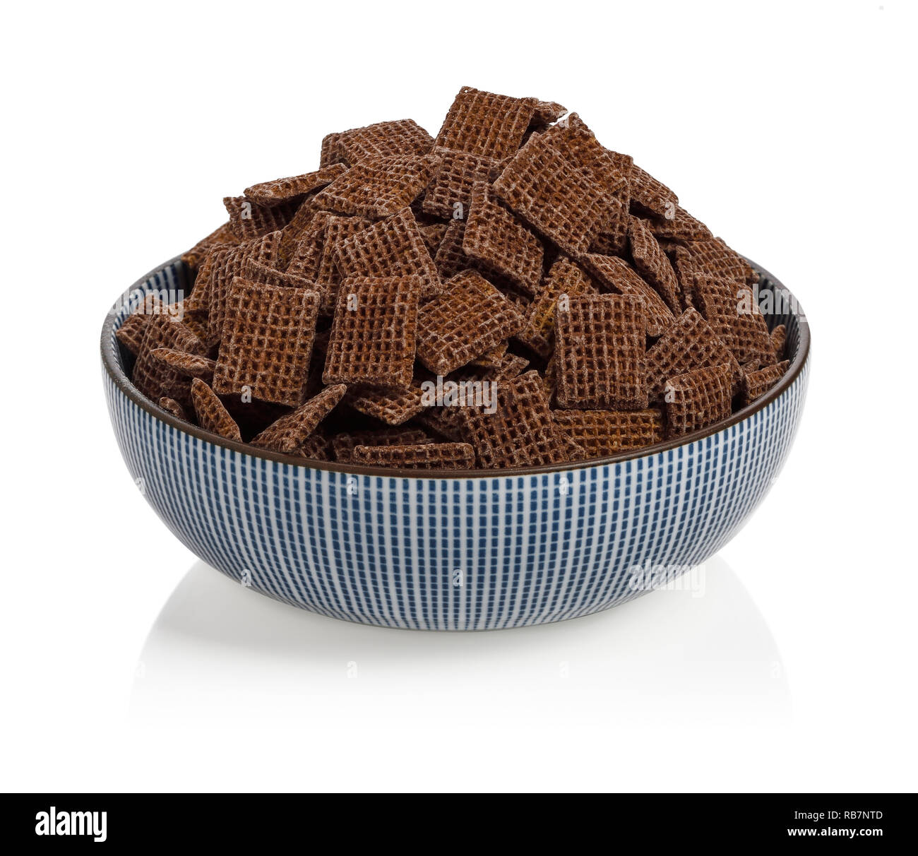 A bowl filled with Nestle Coco Shreddies breakfast cereal Stock Photo