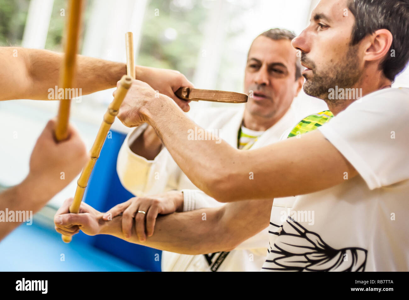 PLOVDIV, BULGARIA - 15. DECEMBER 2018. Stick and knife together fighting techniques training. Kapap instructor Avi Nardia teaches his students on KAPA Stock Photo