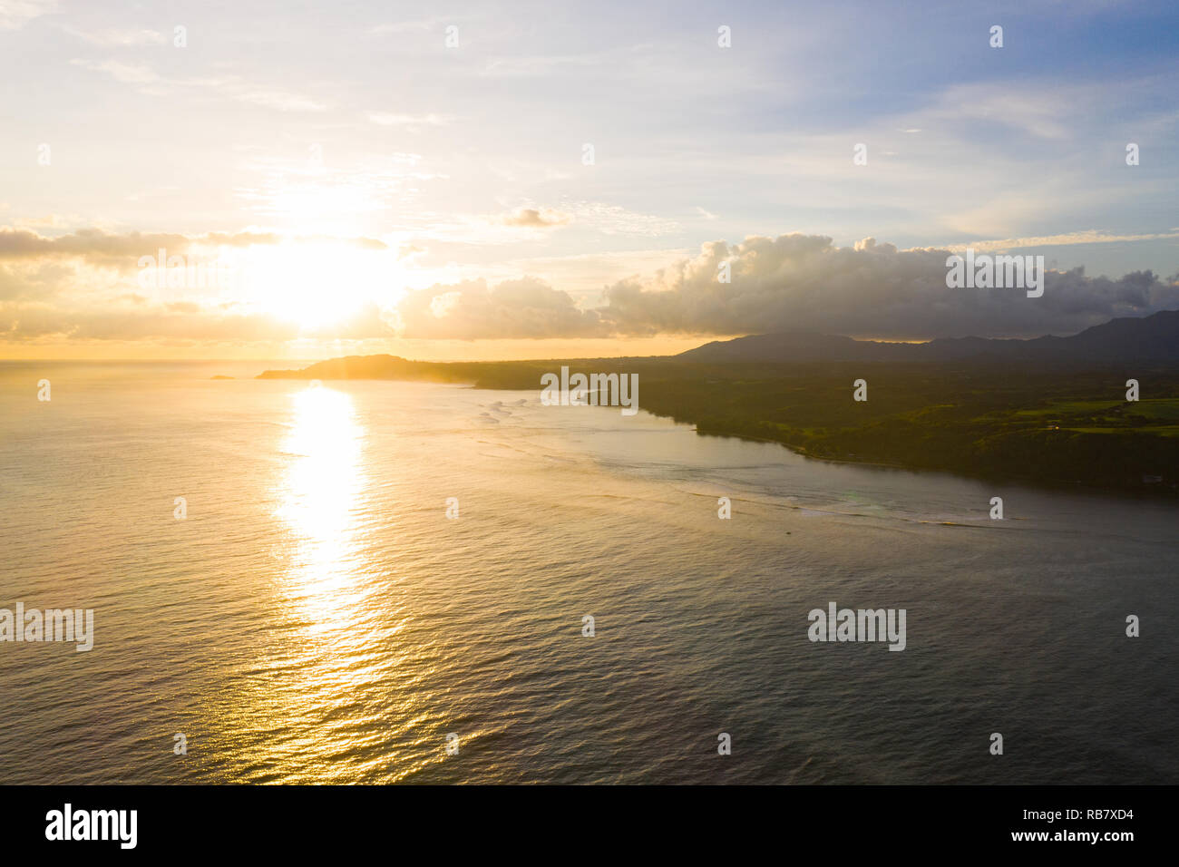 Sunrise Kauai Hawaiian Coastal Landscape Glowing Light Flare Stock
