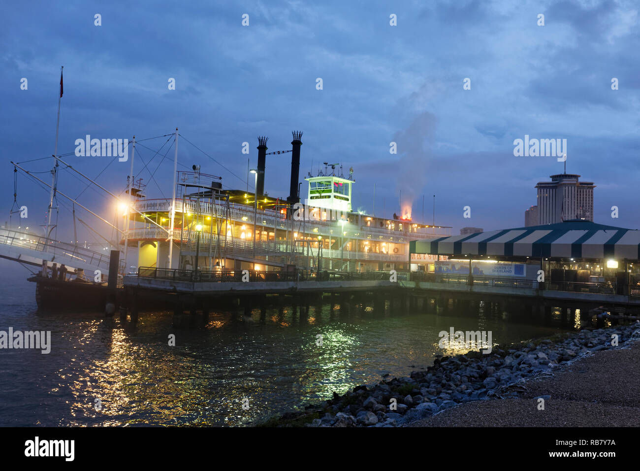 Riverfront of New Orleans along the Mississippi River at night Stock Photo