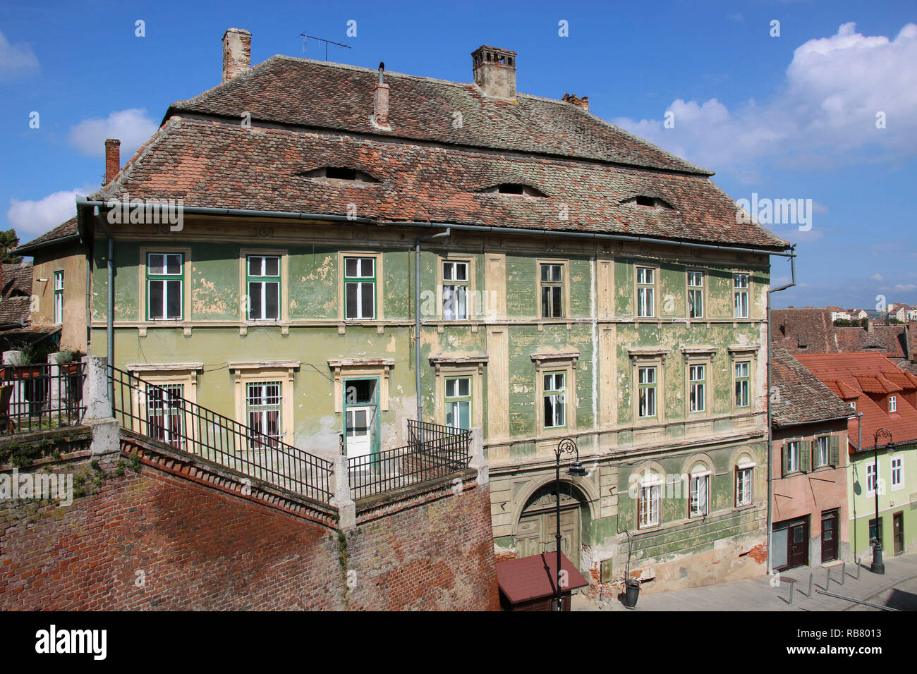 Historical old buildings in the medieval city Sibiu- Hermannstadt, Romania.  Eyes in the roof - architectural detail 'The Romania Eyes' Stock Photo -  Alamy