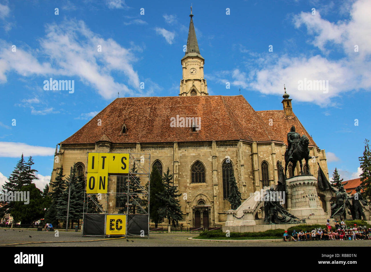CLUJ-NAPOCA, ROMANIA -  JULY 24, 2018: Church of St.Michael with statue of Matei Corvin in Cluj - Napoca. Romania Stock Photo