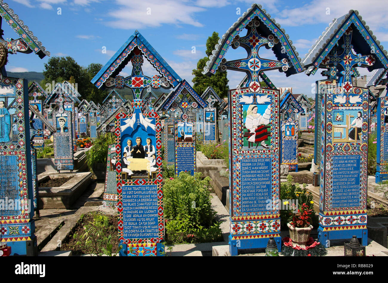 SAPANTA, ROMANIA - JULY 25, 2018: Colorful, painted, wooden crosses at  Merry Cemetery. Famous graveyard in county of Maramures, Romania Stock  Photo - Alamy
