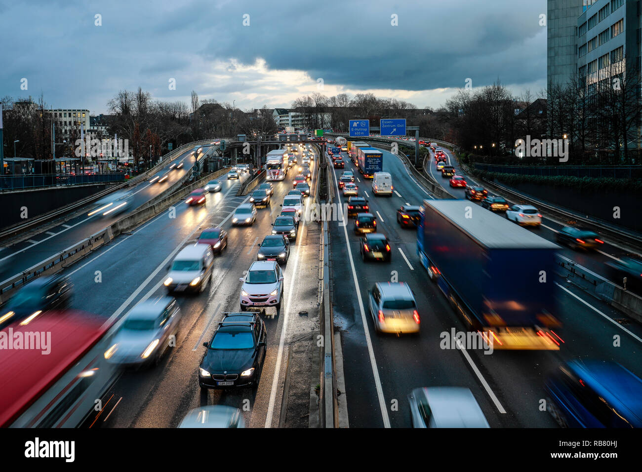 Essen, North Rhine-Westphalia, Ruhr area, Germany - Blue environmental zone, motorway A40 at the evening traffic in the city centre of Essen, here on  Stock Photo