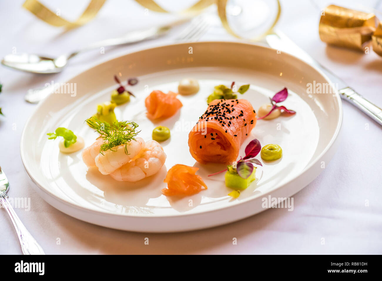 rolled smoked salmon with dill and prawns Stock Photo