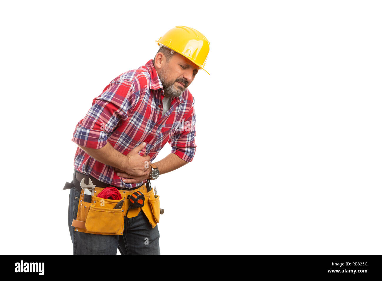 Sick builder with stomachache feeling nauseous isolated on white studio background Stock Photo