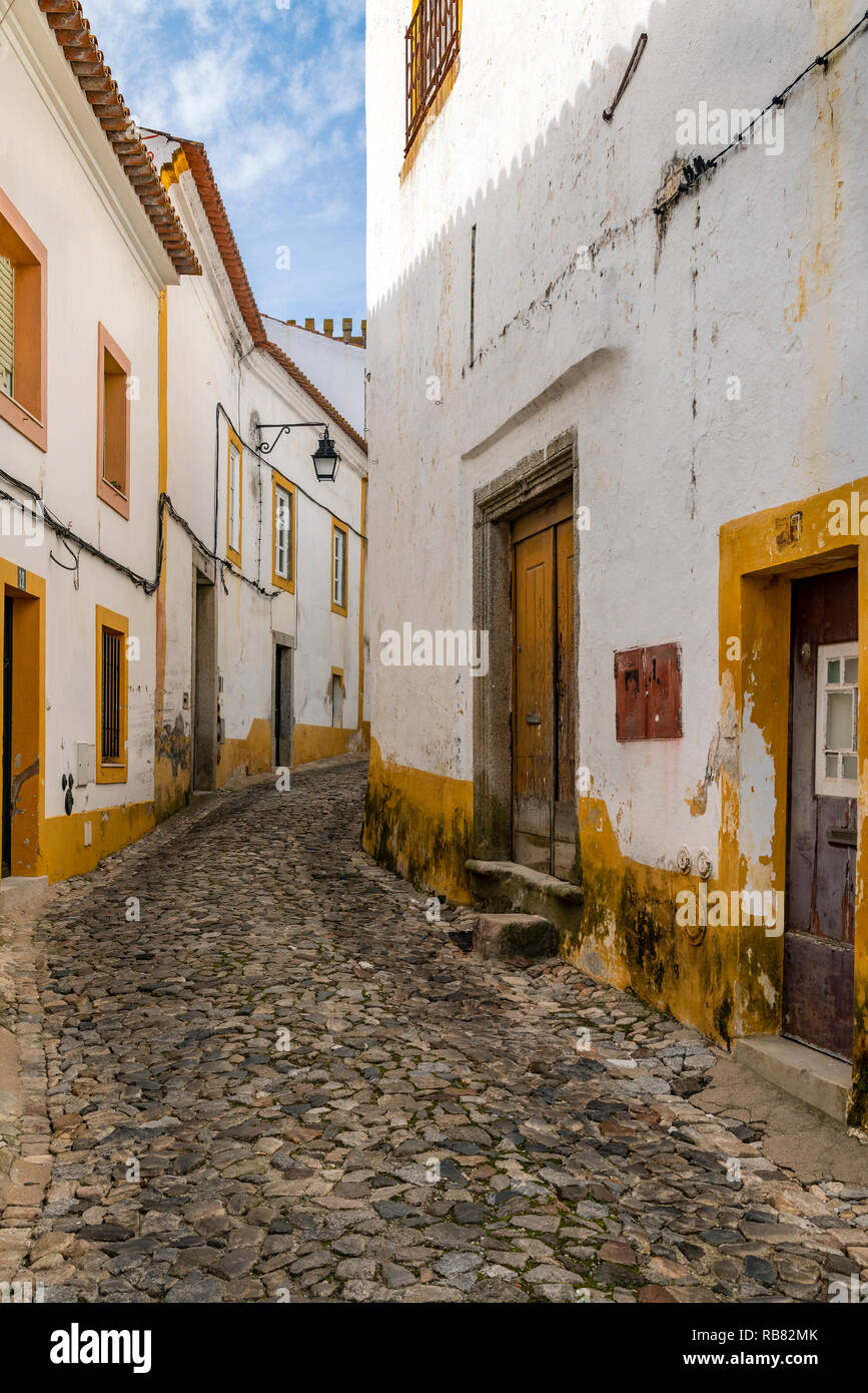 Cobbled street in the old town,  Evora, Alentejo, Portugal Stock Photo