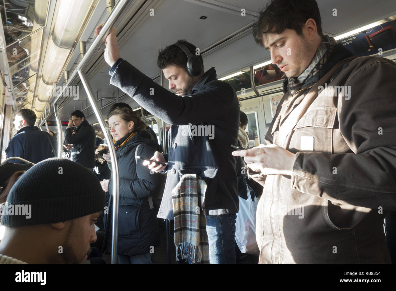Subway Train Riders Standing High Resolution Stock Photography and ...