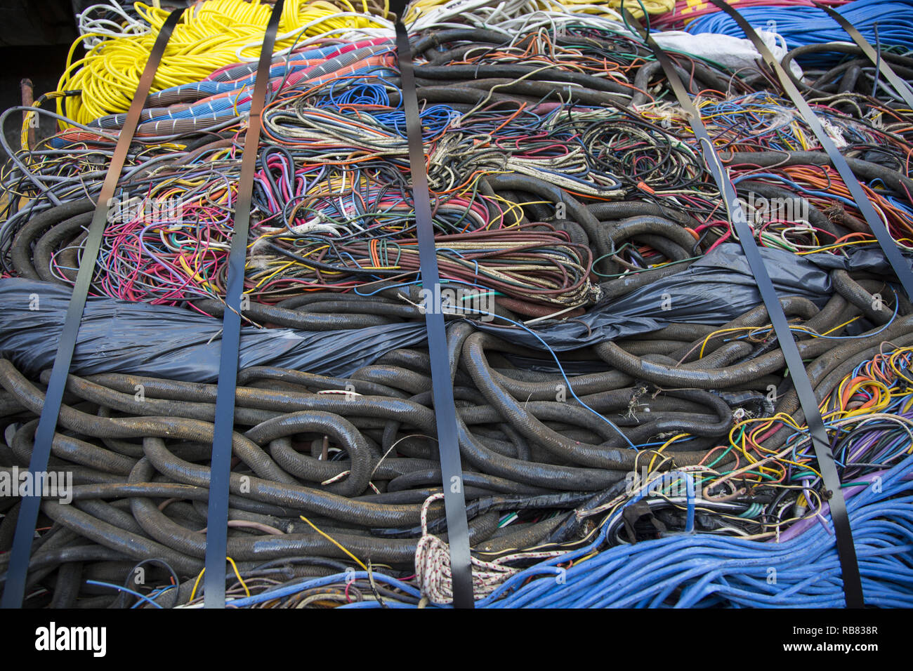 All sorts of electrical wiring and cables bunched together for