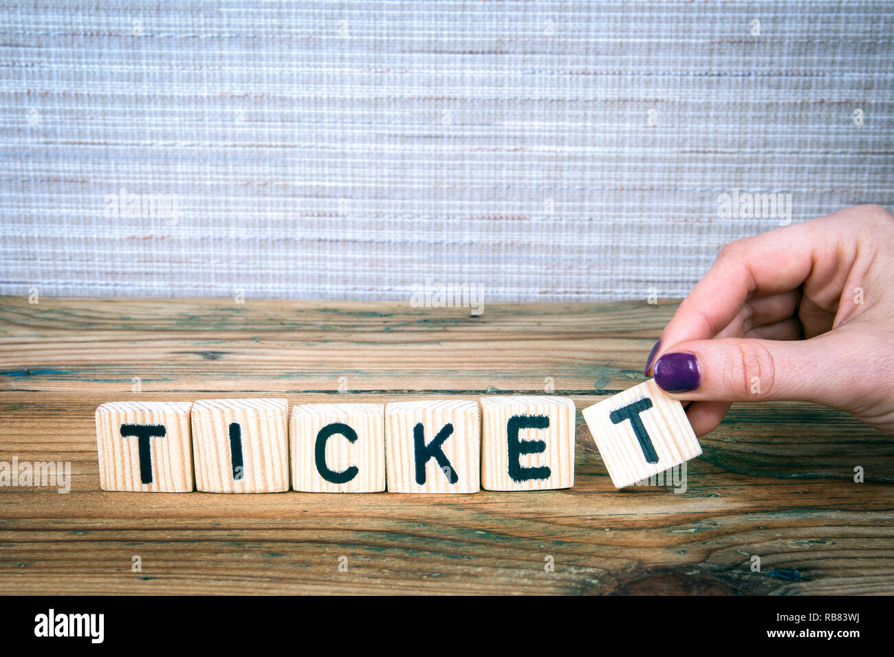 ticket. Wooden letters on the office desk Stock Photo Alamy