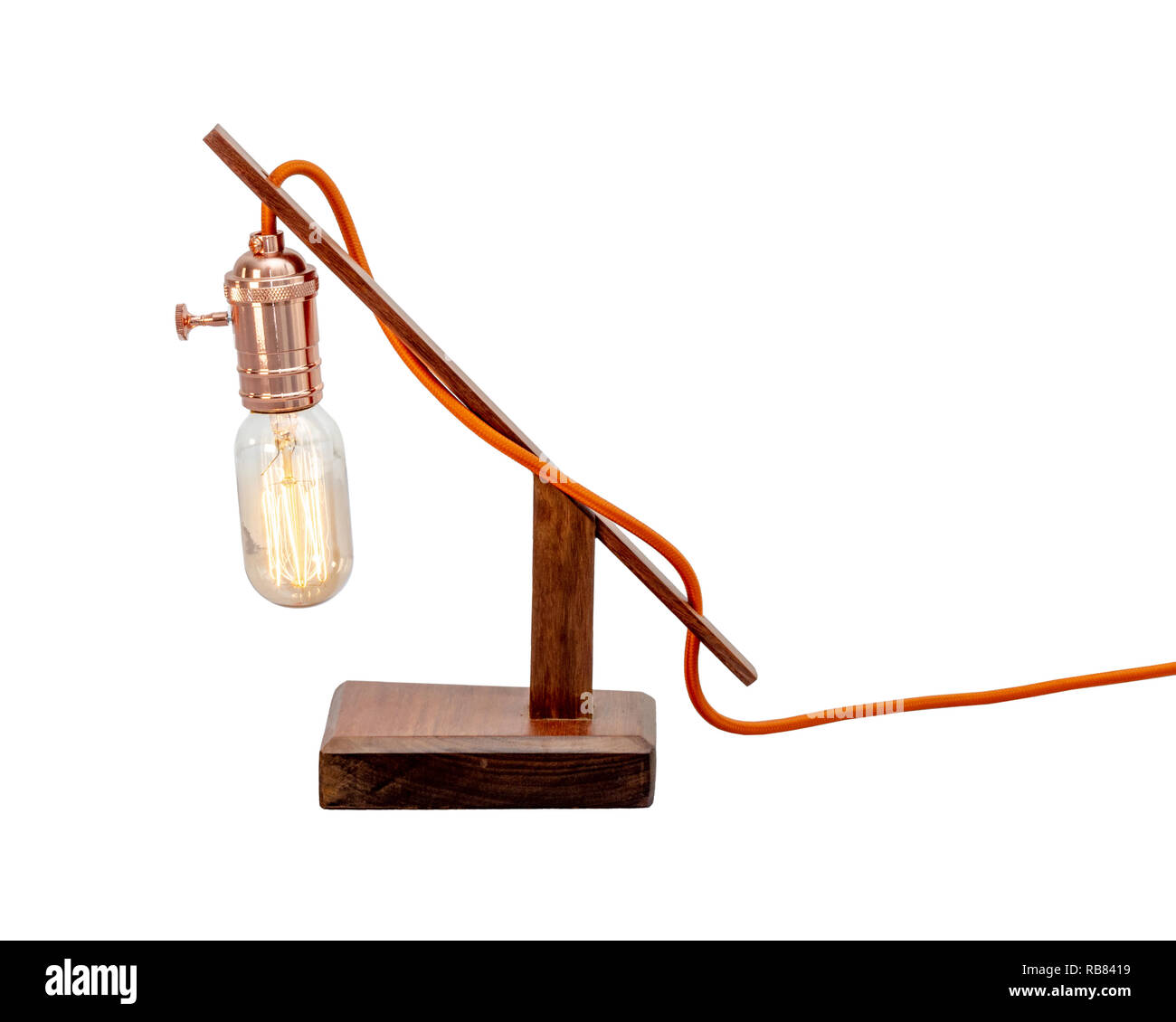 Rustic wood table lamp with small white lampshade isolated on white