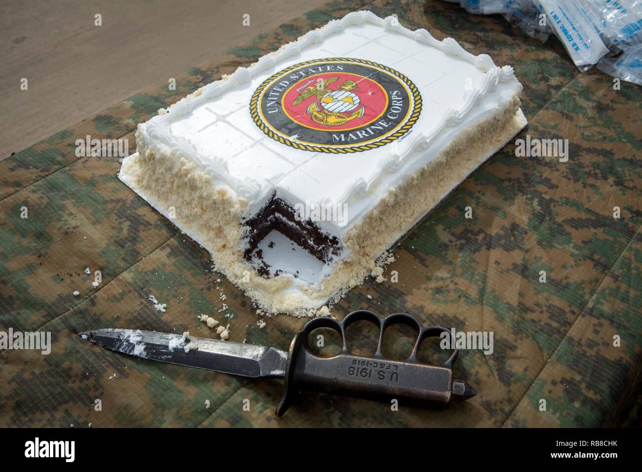 U.S. Marines from Weapons Company, 3rd Battalion, 7th Marine Regiment, Special Purpose Marine Air-Ground Task Force - Crisis Response - Central Command, hold a cake-cutting ceremony in honor of the 241st Marine Corps Birthday in Erbil, Iraq, Nov. 10, 2016. SPMAGTF-CR-CC is forward deployed in several host nations, with the ability to respond to a variety of contingencies rapidly and effectively. Stock Photo