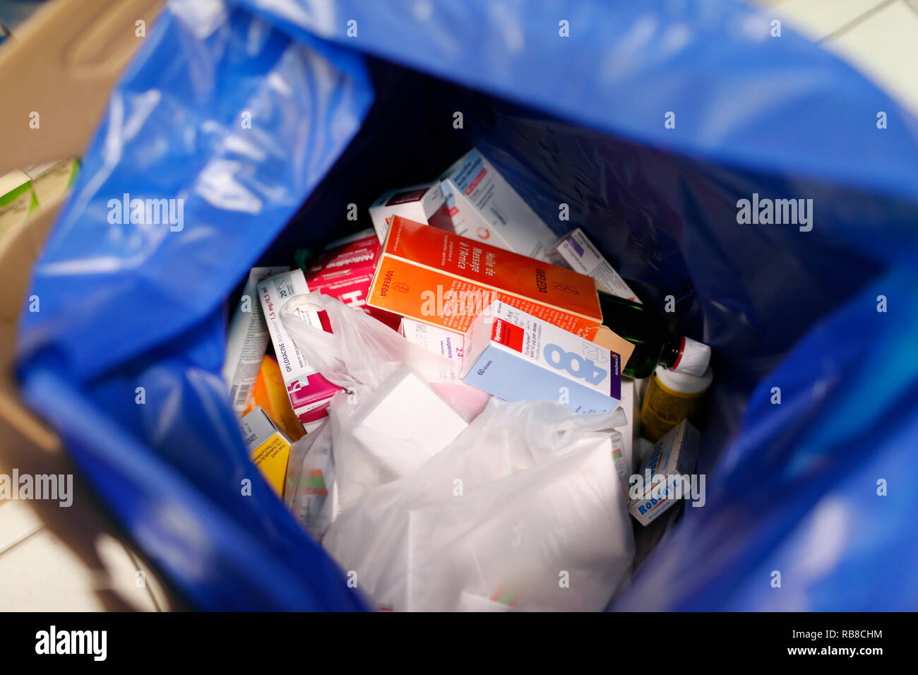 Pills and drugs in a blue trash bag. France Stock Photo Alamy