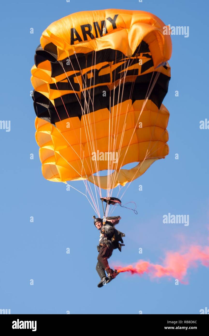 A Member of the U.S. Army Parachute Team Golden Knights enters M&T Bank Stadium before the 2016 Army Navy Game in Baltimore, Md., Dec. 10, 2016.  The U.S. Military Academy cadets from West Point broke a 14-year Navy win streak after defeating the U.S. Naval Academy Midshipmen 21-17. Stock Photo
