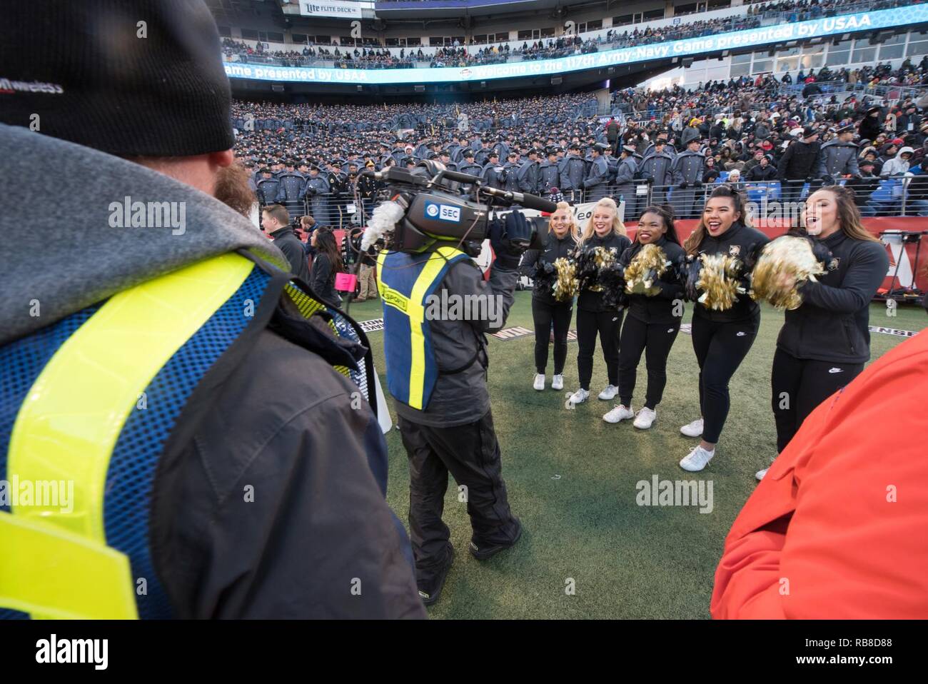 U.S. Military Academy at West Point cheerleaders pose for the CBS