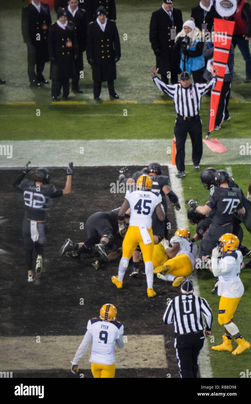 An official signals touchdown after U.S. Military Academy at West Point Quarterback Ahmad