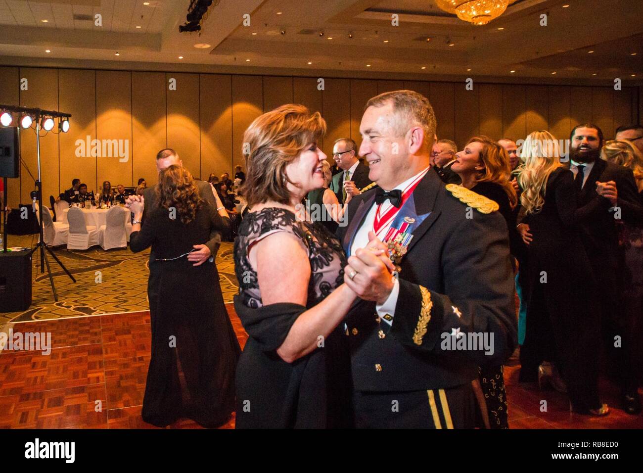 U.S. Army Maj. Gen. Stephen Danner, Adjutant General of the Missouri National Guard and his wife Katie Danner share a dance during the 8th Annual Missouri National Guard Birthday Ball, at Tan-Tar-A Resort, Osage Beach, Mo., December 10, 2016.  The National Guard was celebrating its 380th birthday, which was established on December 13, 1636. Stock Photo