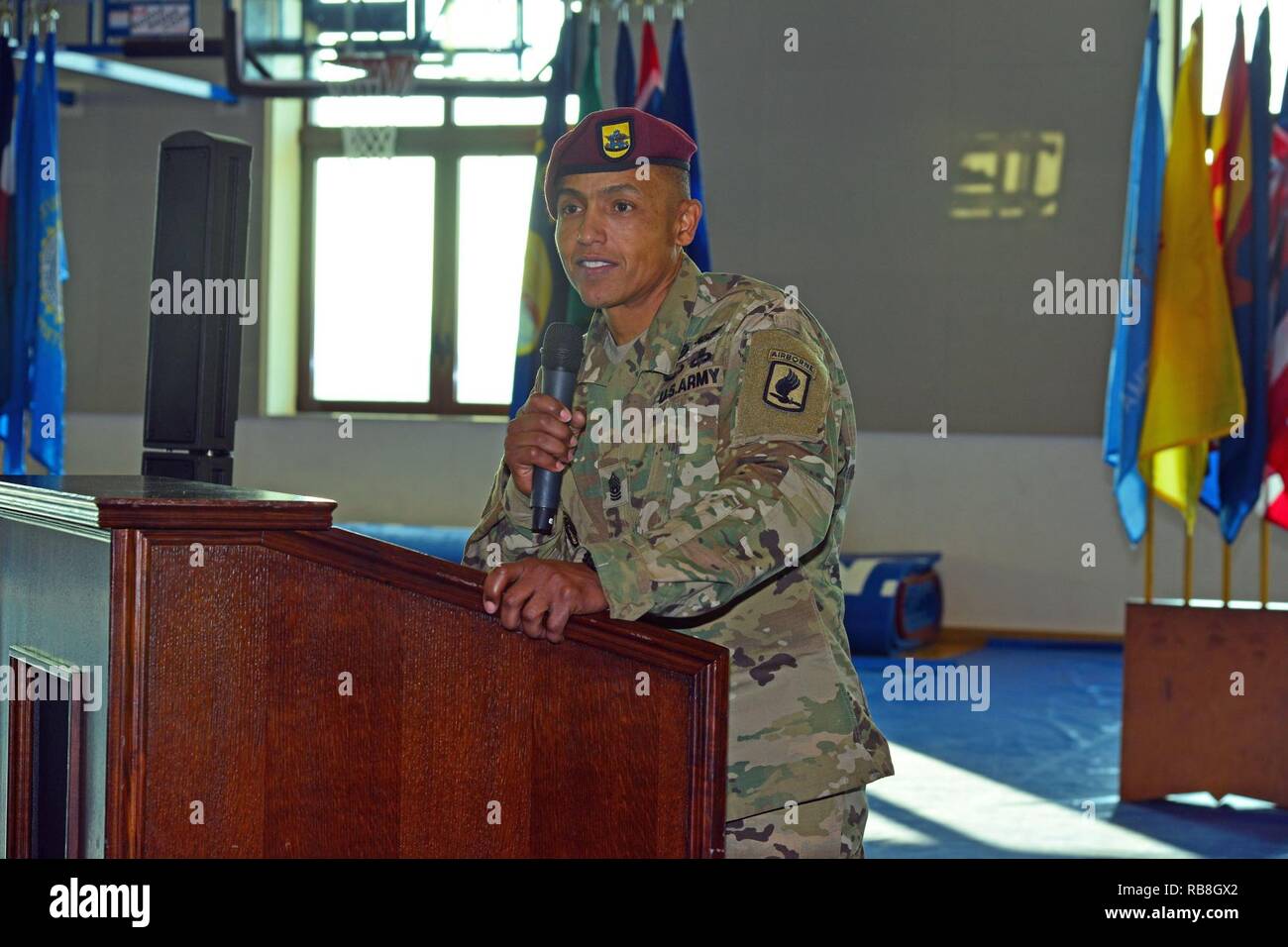 Outgoing Command Sgt. Maj. Todd M. Burke, 173rd Brigade Support Battalion,173rd Airborne Brigade , gives a speech, Dec. 13 2016, during a change of responsibility ceremony at Caserma Del Din in Vicenza, Italy.  The 173rd Airborne Brigade based in Vicenza, Italy, is the Army Contingency Response Force in Europe, and is capable of projecting forces to conduct the full of range of military operations across the United State European, Central and Africa Commands areas of responsibility. Stock Photo