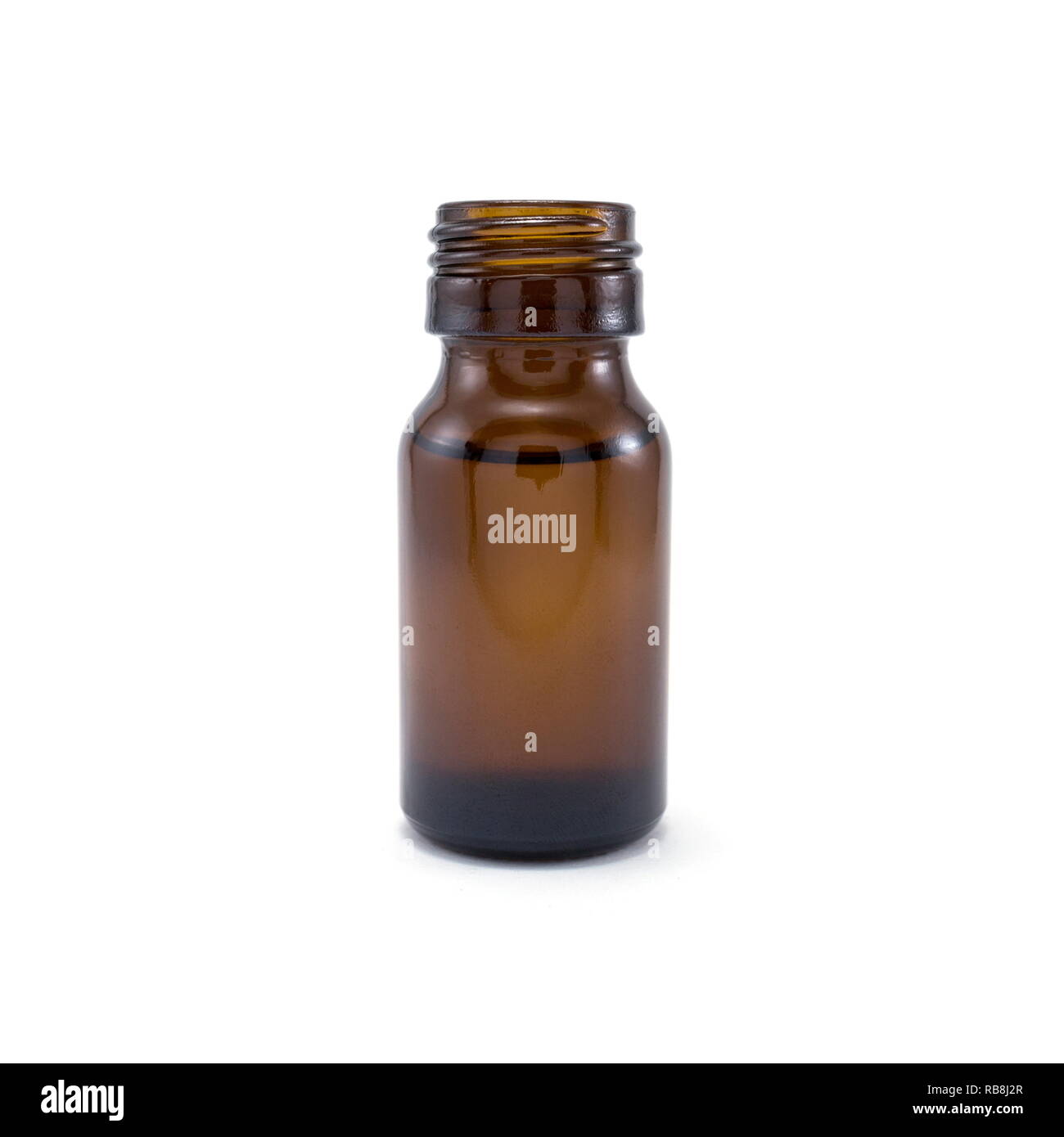 Brown glass bottle with Natural extracts inside isolated on a white background. Stock Photo